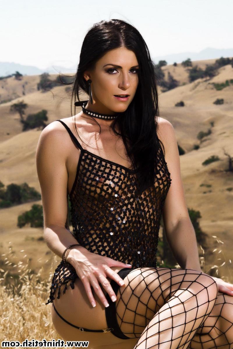 16P Skinny petite girl in fishnet outdoors