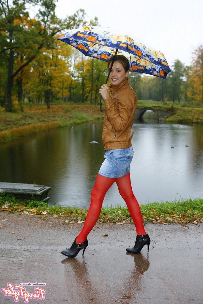 15P Eighteen year old flashes outdoors in red nylons
