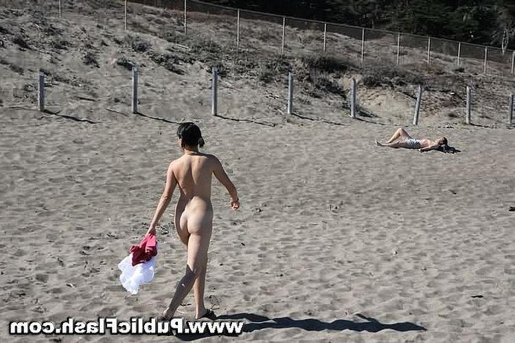 16P Petite Nudist Strips n Plays Naked On Public Beach