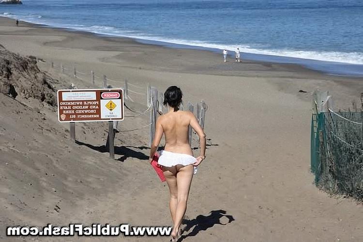 16P Petite Nudist Strips n Plays Naked On Public Beach