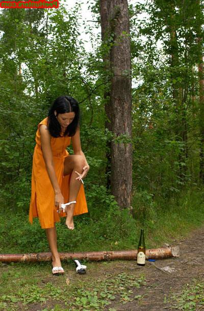 16P Sexy brunette peeing in the park road