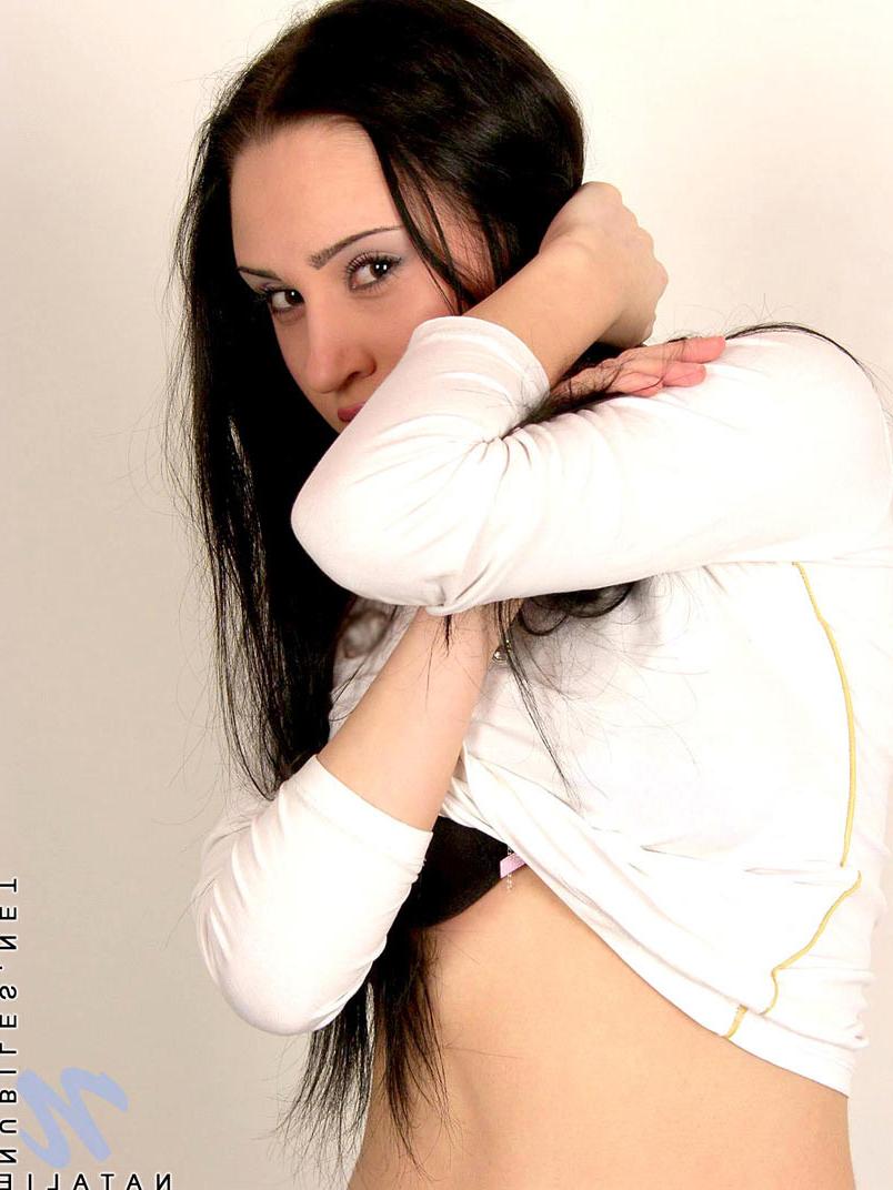 10P Black angel nubile natalie bends over and points the way to teen heaven.