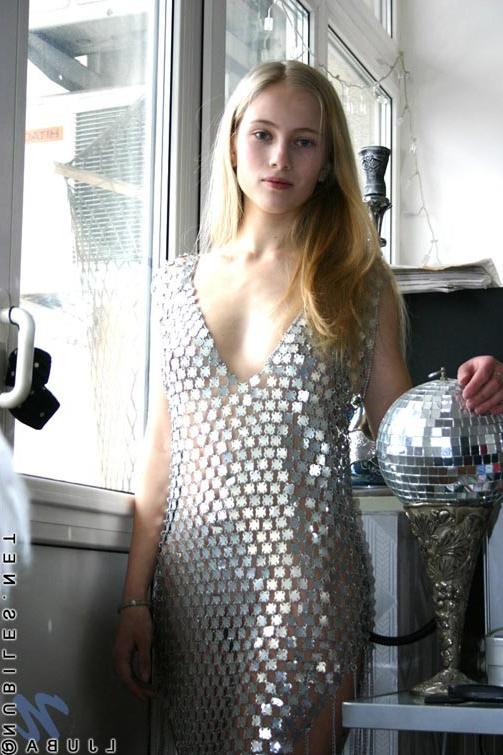14P Slender blond teen hottie struts around in a metal dress you gotta see to believ