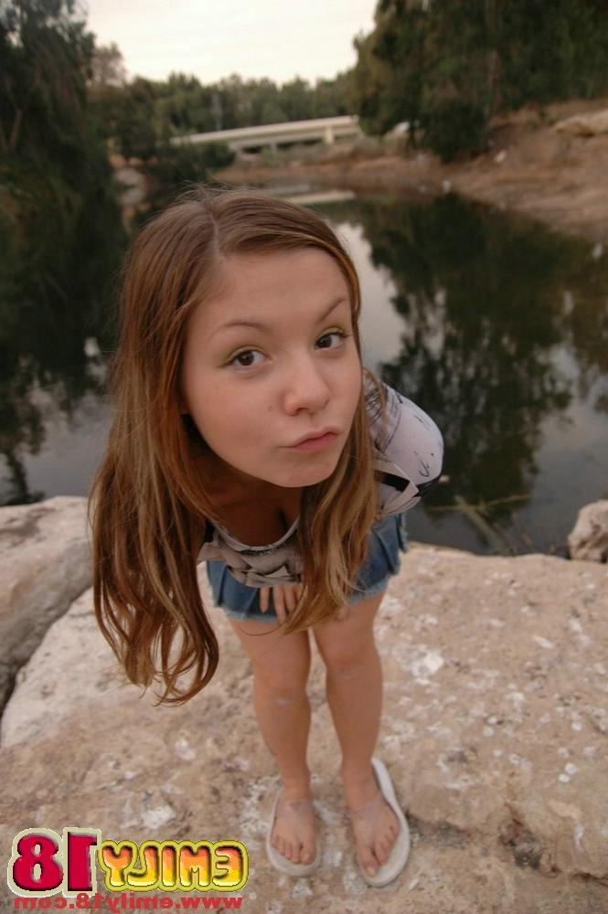 15P Teen Emily pulling her skirt up