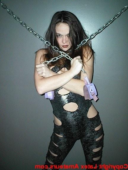 15P Latex slut plays with pussy