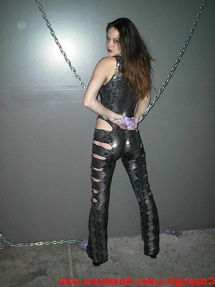 15P Latex slut plays with pussy