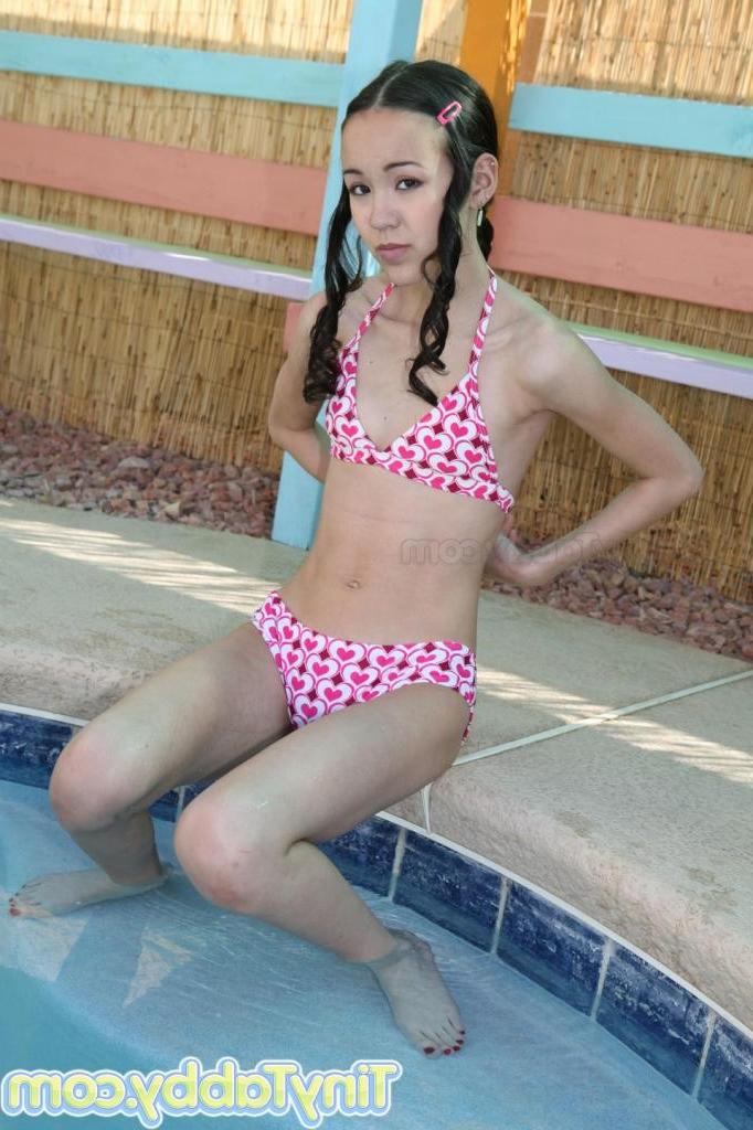 15P A sexy latina bikini teen shows her skinny body