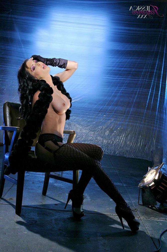 15P Jessica Jaymes posing in sexy black fishnet stockings