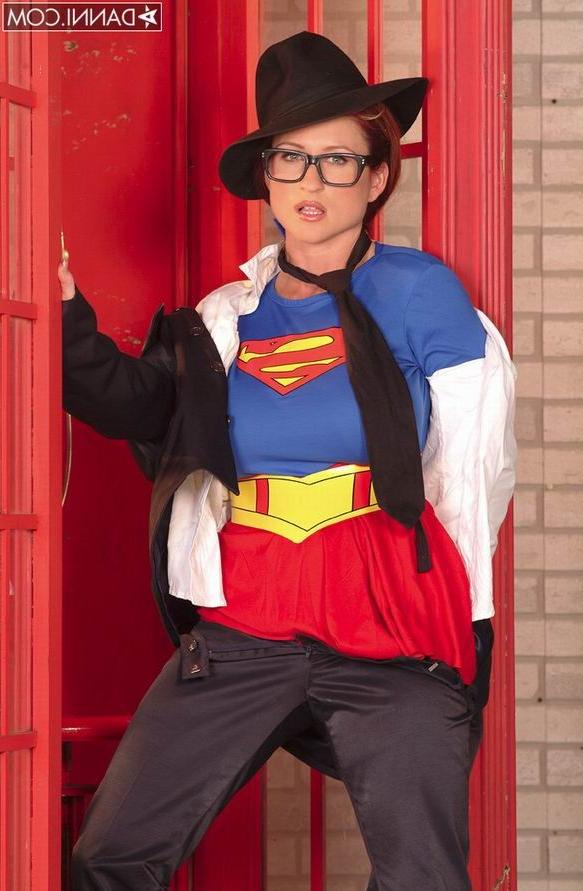 16P Busty Brittany posing in her latex supermen outfit
