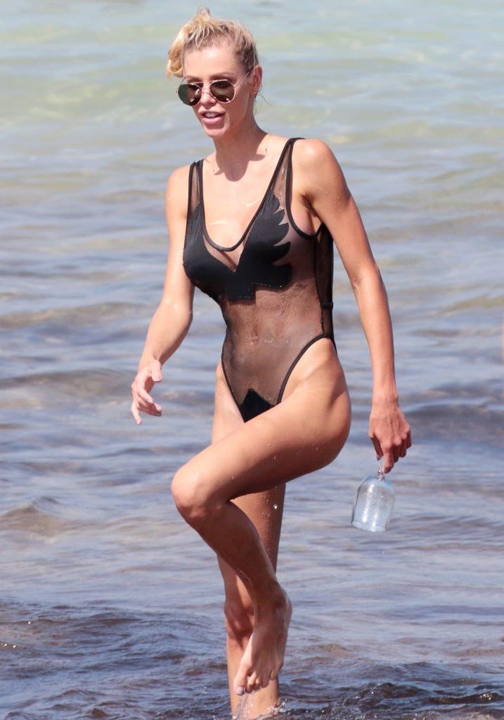 9P Lisa Hochstein Gets Wet In A See-Though Bodysuit