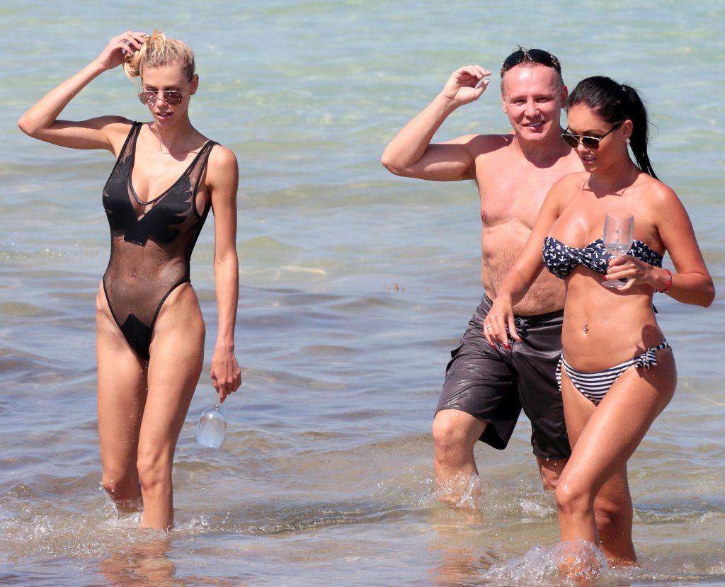 9P Lisa Hochstein Gets Wet In A See-Though Bodysuit