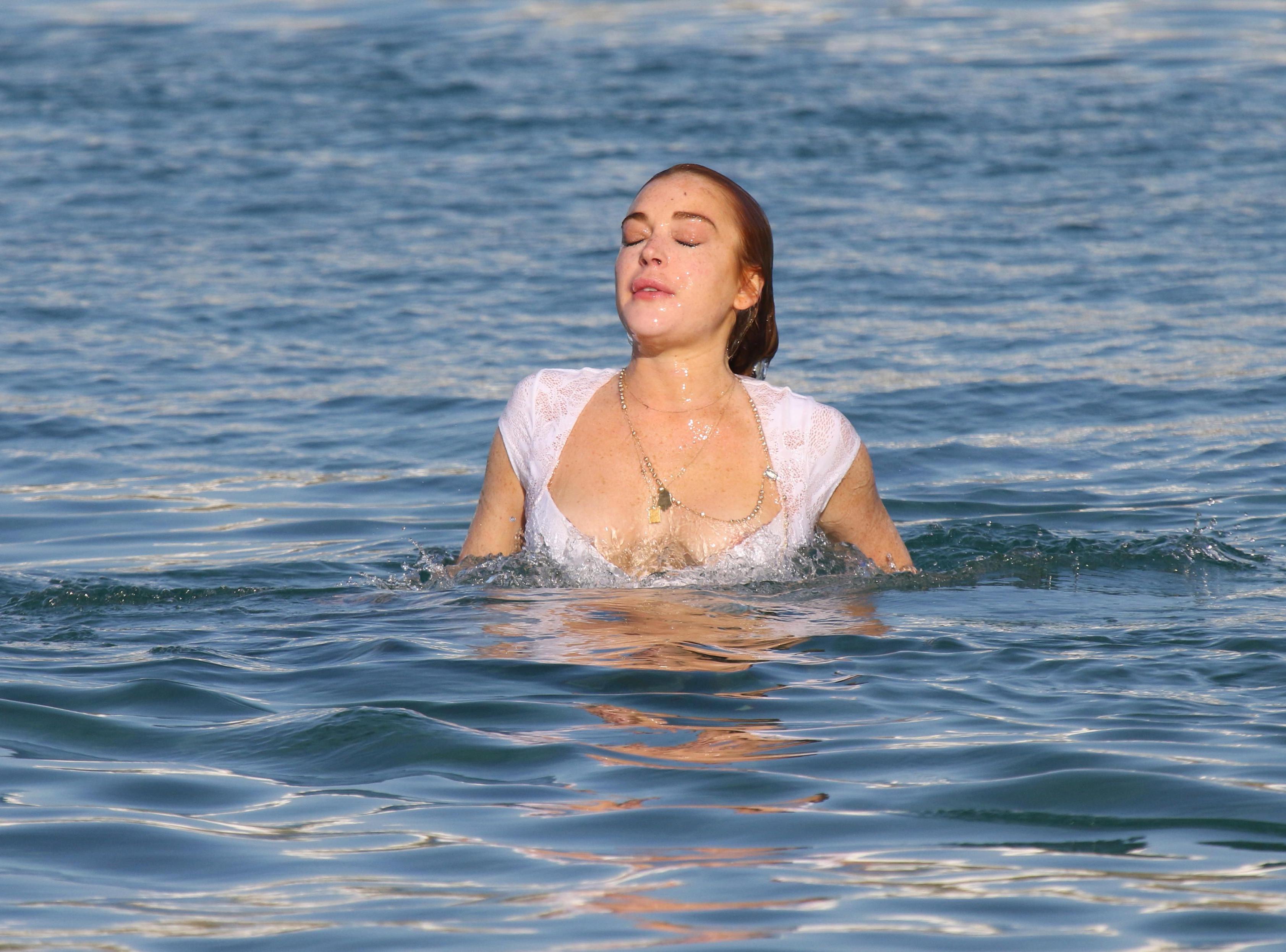 11P Lindsay Lohan wet in bikini