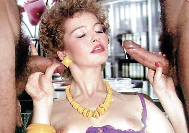 10P Redhead getting two cocks in her holes
