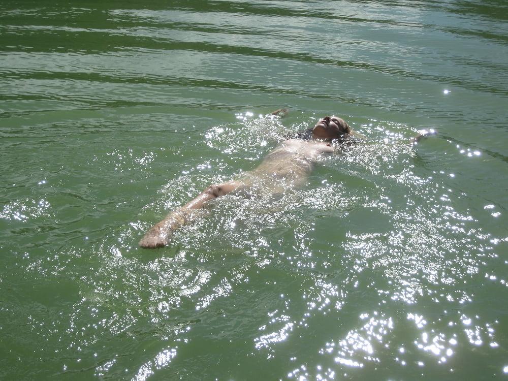 13P NUDIST GIRL IN CRATER LAKE