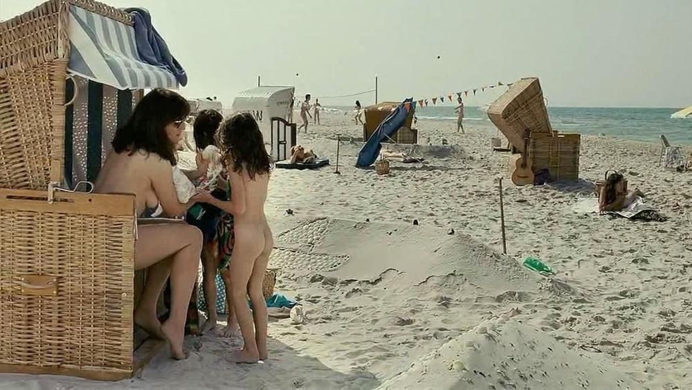 25P 0812 Daily life of nude beach.