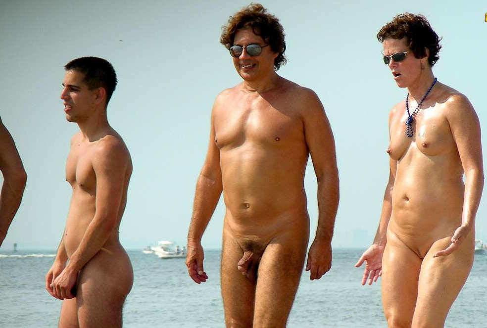 25P 0704 Nude beach couples and groups.