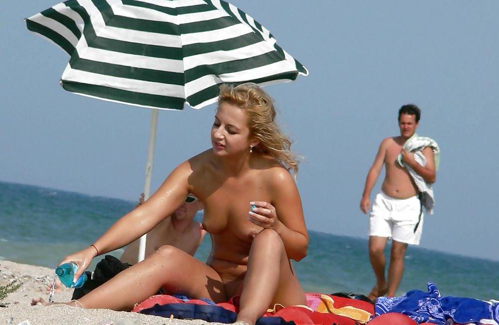 25P Hot Tits at the Beach 24