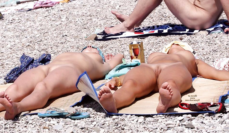 10P Two girls by the beach.