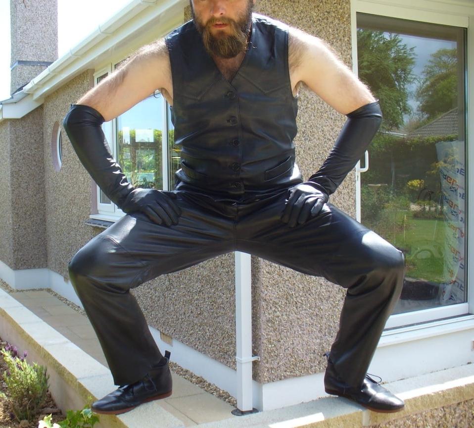 15P Leather Master outdoors posing in full leather