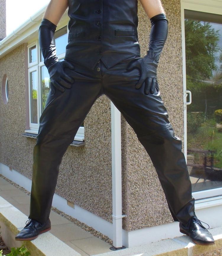 15P Leather Master outdoors posing in full leather