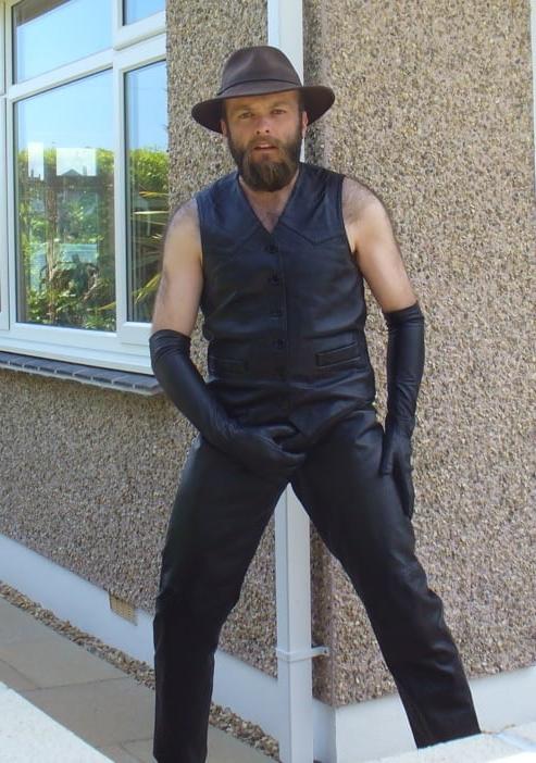 15P Leather Master outdoors posing in full leather
