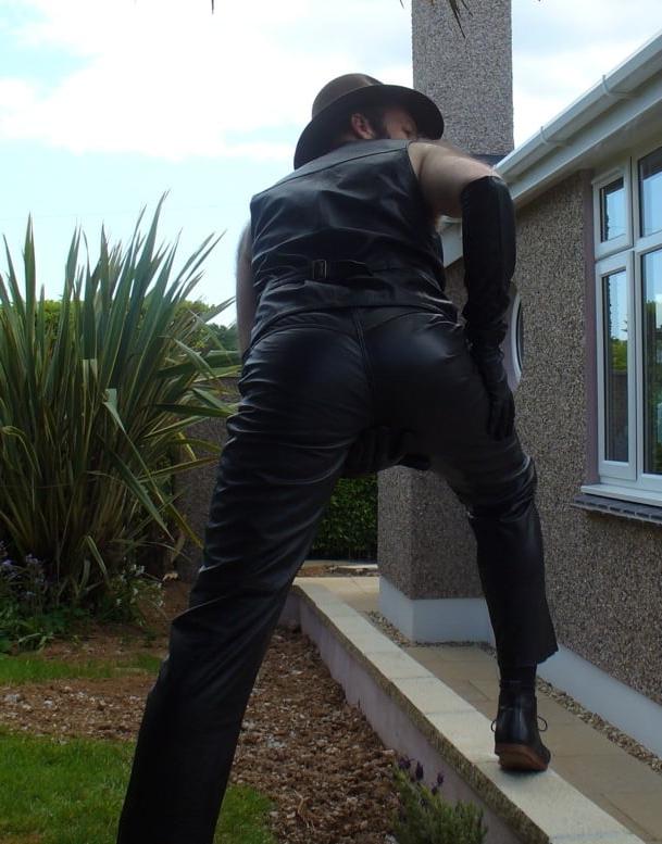 15P Leather Master outdoors posing in full leather