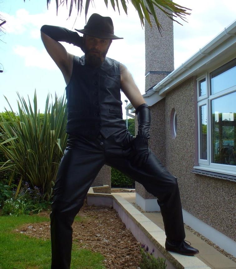 15P Leather Master outdoors posing in full leather