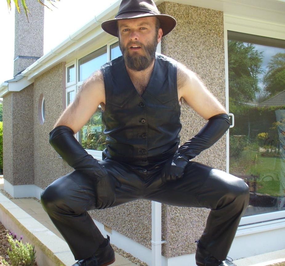 15P Leather Master outdoors posing in full leather
