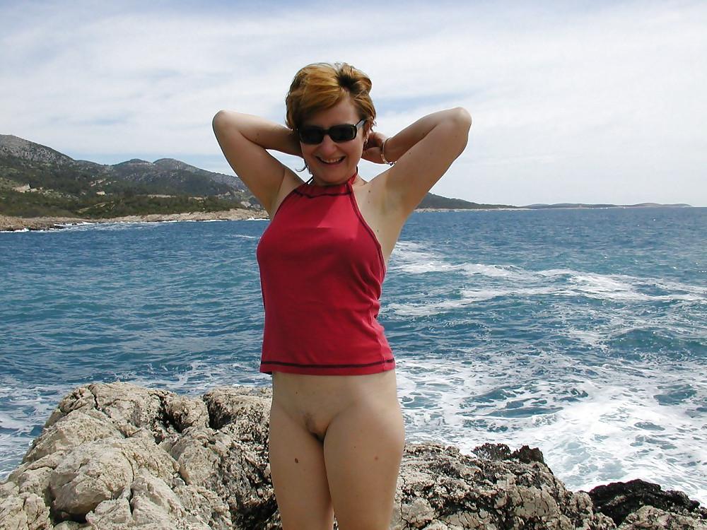 25P Mature women on the beach