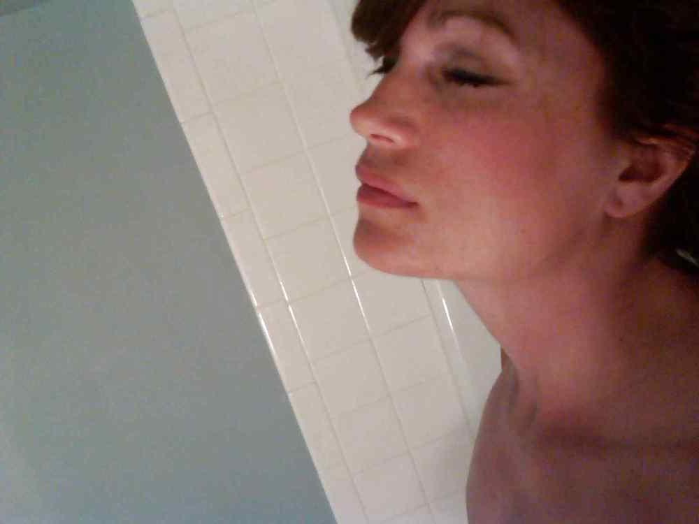 22P Beautiful mature woman taking a photo