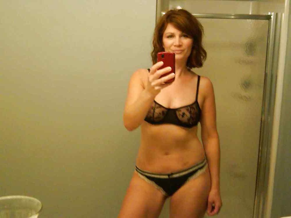 22P Beautiful mature woman taking a photo