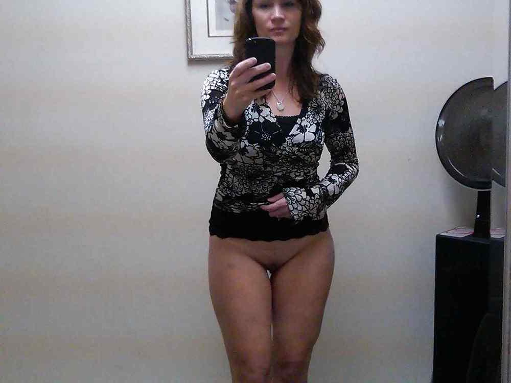 22P Beautiful mature woman taking a photo