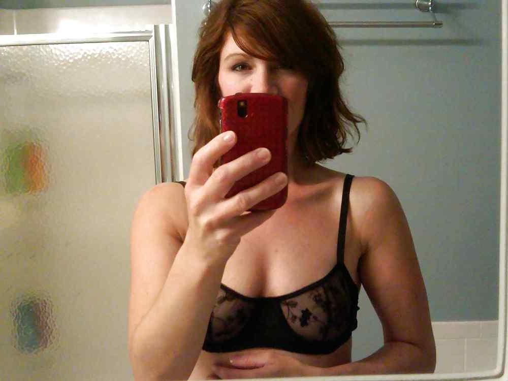 22P Beautiful mature woman taking a photo