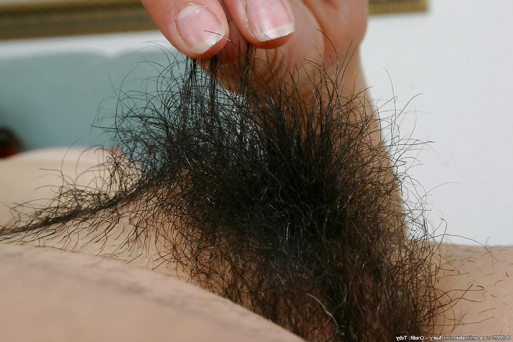 10P Young hairy girls showing their muffs.