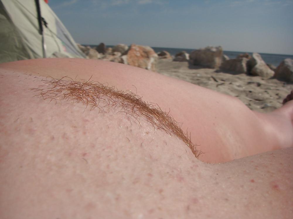 24P Young busty girl on the beach - N. C. 
