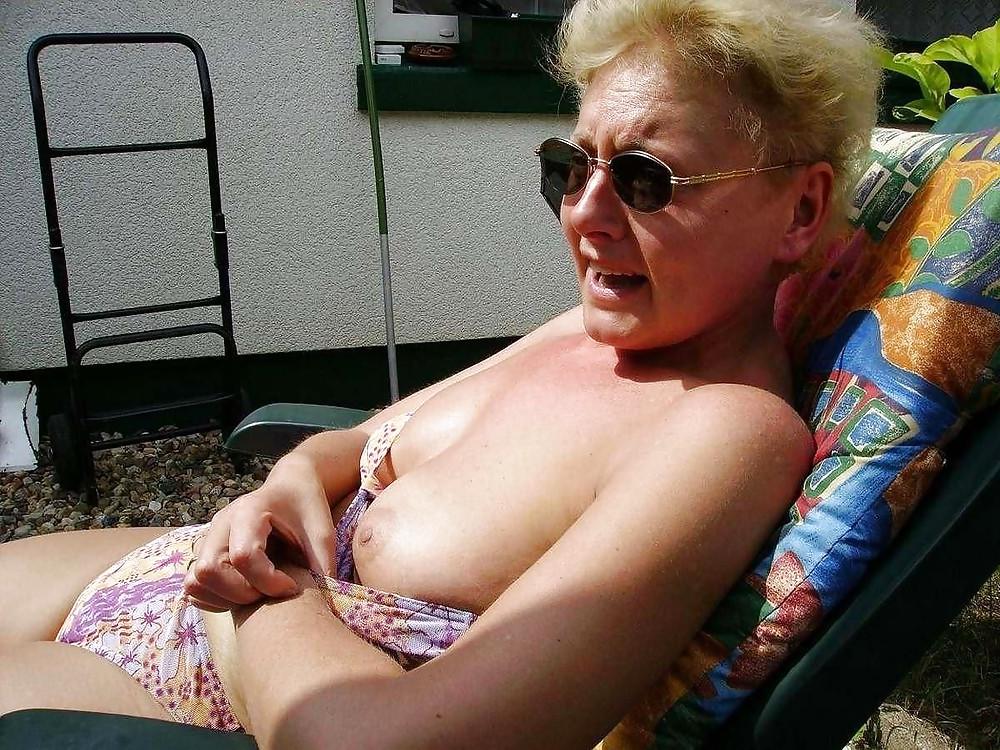 20P Sunbathing at the beach 1.