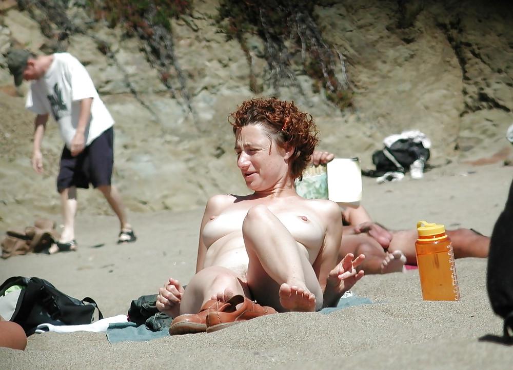 25P Two MILF's at nudie beach