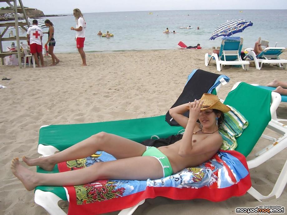 10P Horny tanned beach girl