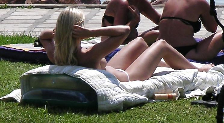 25P Voyeurpics of topless danish blonde on Hungarian beach