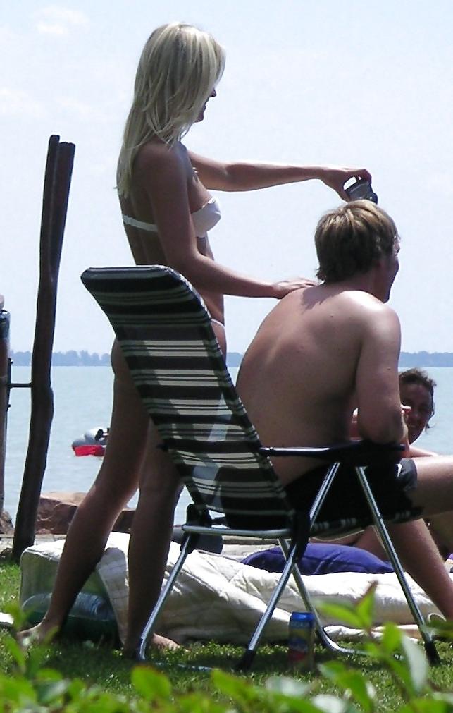25P Voyeurpics of topless danish blonde on Hungarian beach