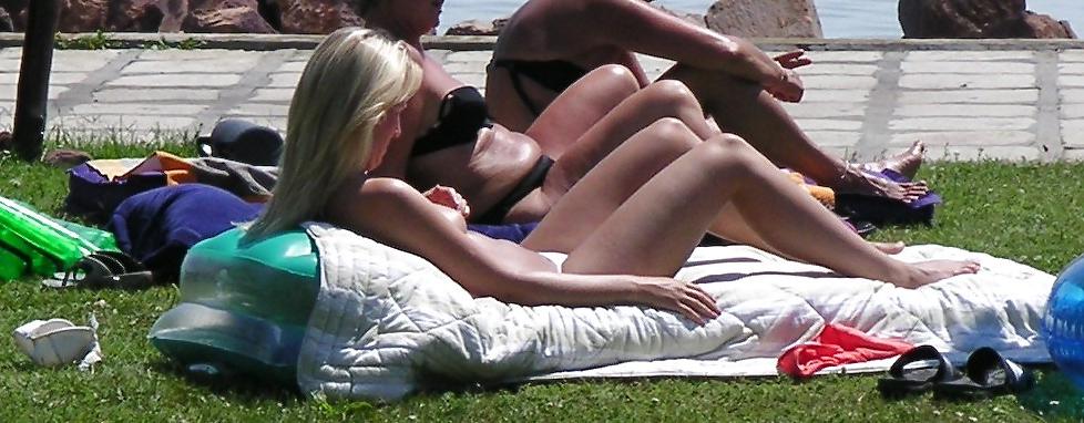 25P Voyeurpics of topless danish blonde on Hungarian beach
