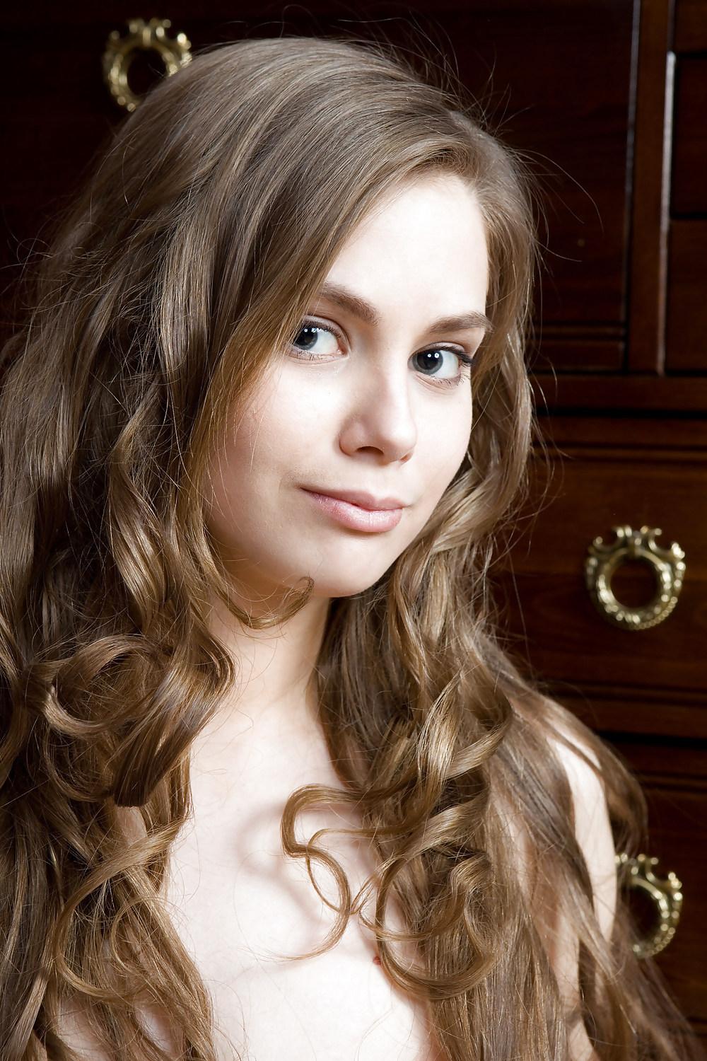 20P Brunette hairy teen Kristel posing in stockings and nude