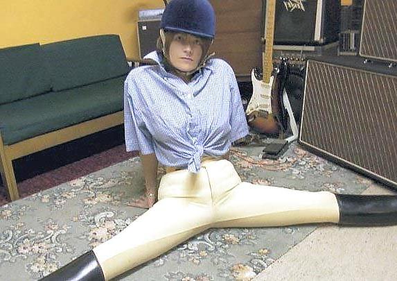 15P Woman in riding gear Collar up fetish