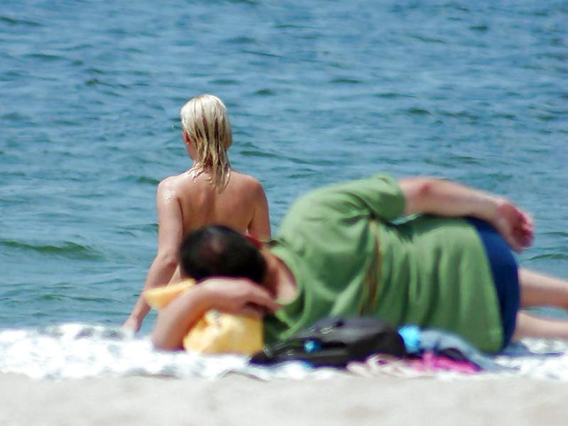 10P Mature woman with perfect tits on the beach