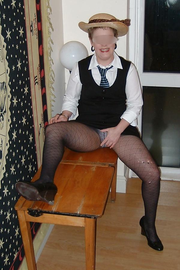 11P Slutty schoolgirl in ripped tights