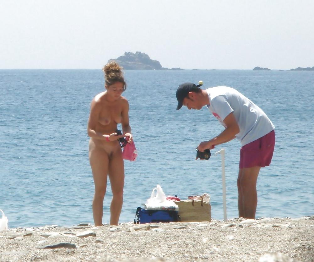 21P Beach undressing strip getting nude