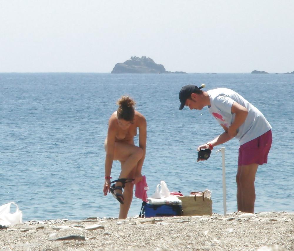 21P Beach undressing strip getting nude