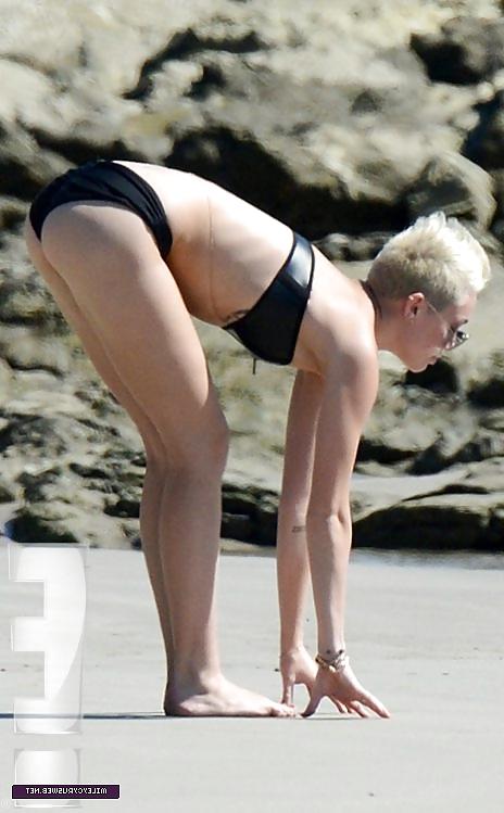 22P Miley Cyrus yoga at the beach 