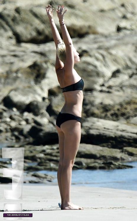 22P Miley Cyrus yoga at the beach 