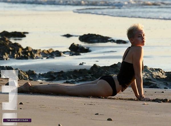 22P Miley Cyrus yoga at the beach 